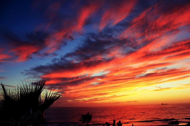 Rosarito Beach at sunset by Rick Blakely